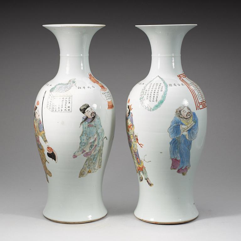 A pair of large Chinese famille rose vases, 20th Century with seal mark in red.