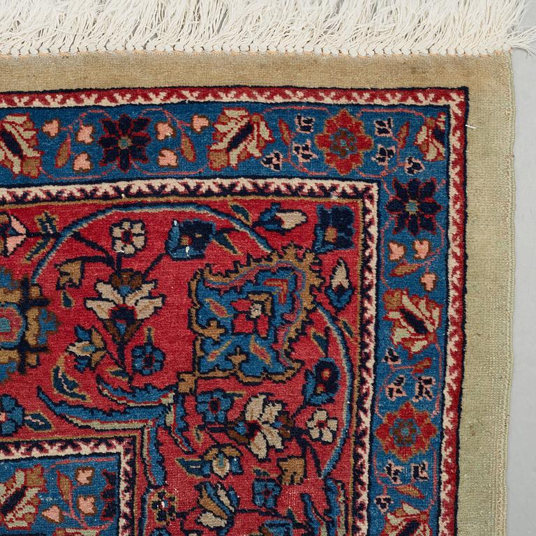 A CARPET, a semi-antique Tabriz probably, ca 393 x 284 cm.