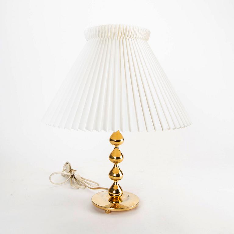 A pair of 24 carat gold plated "Teardrop" table lamps by Hugo Asmussen, Denmark, second half of the 20th century.
