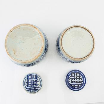 A set of two Chinese blue and white jars with covers, 20th century.