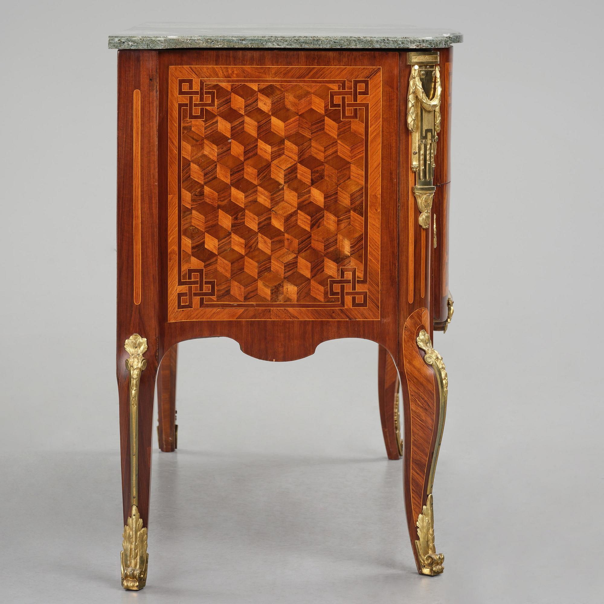 A Louis XVI rosewood and amaranth marquetry ormolu-mounted commode by Leonard Boudin (master in Paris 1761).