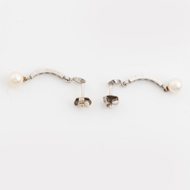Necklace and earrings, a pair, cultured pearls, white gold, and brilliant- and octagon-cut diamonds.