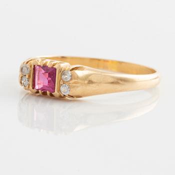 Ring, gold with synthetic pink stone and small white stones.