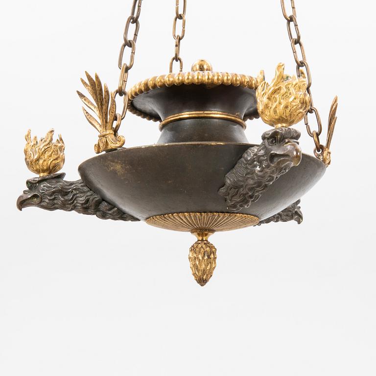An Empire bronze chandelier.