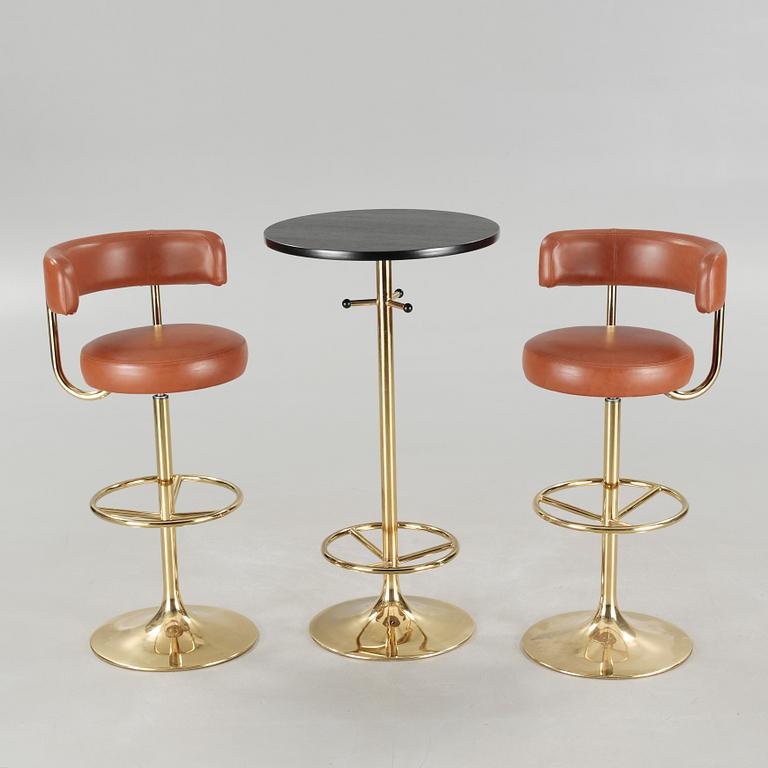 Two bar stools and a bar table by Börje Johanson, model "Jupiter", for Johanson design, second half of the 20th century.
