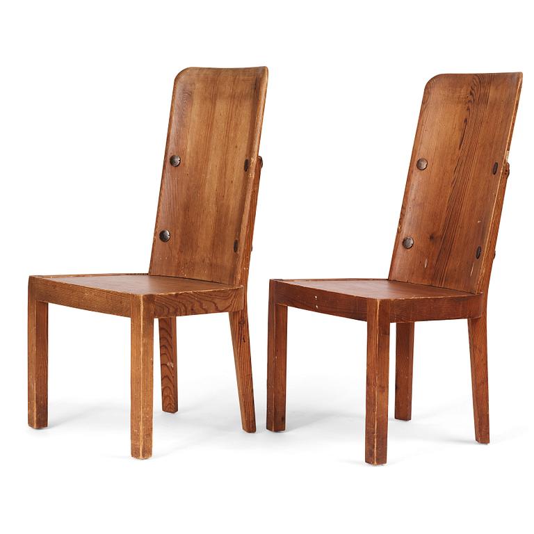 Axel Einar Hjorth, a pair of stained pine 'Lovö' chairs, Nordiska Kompaniet, Sweden 1930s.