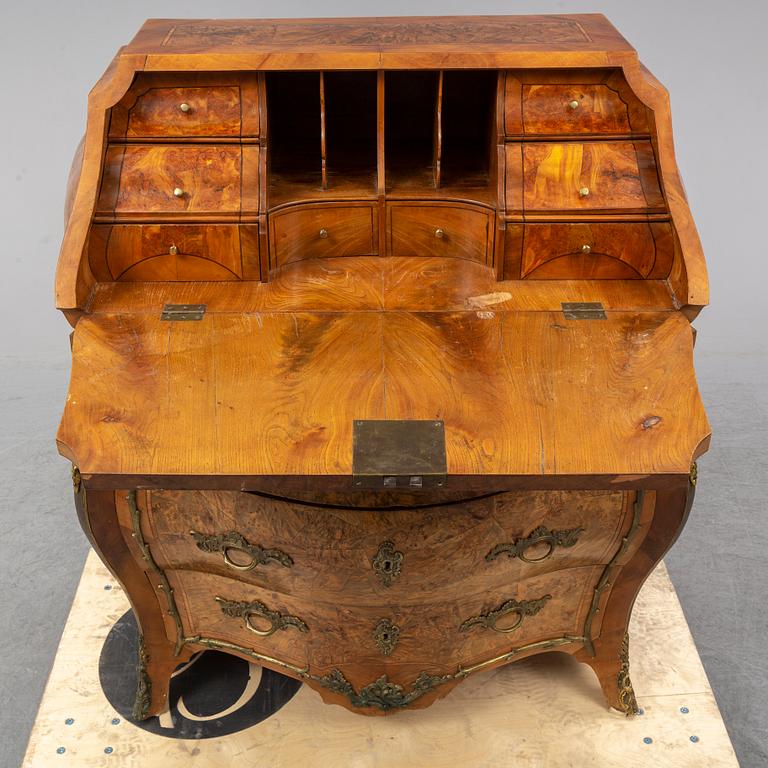 A 19th century rococo style secretaire.
