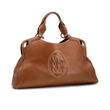 371. CARTIER, a brown leather bag.