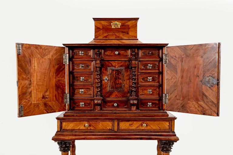 A first half of the 18th century walnut cabinet.