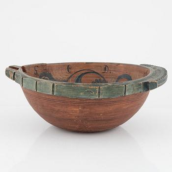 A lathed and painted bowl dated 1783.