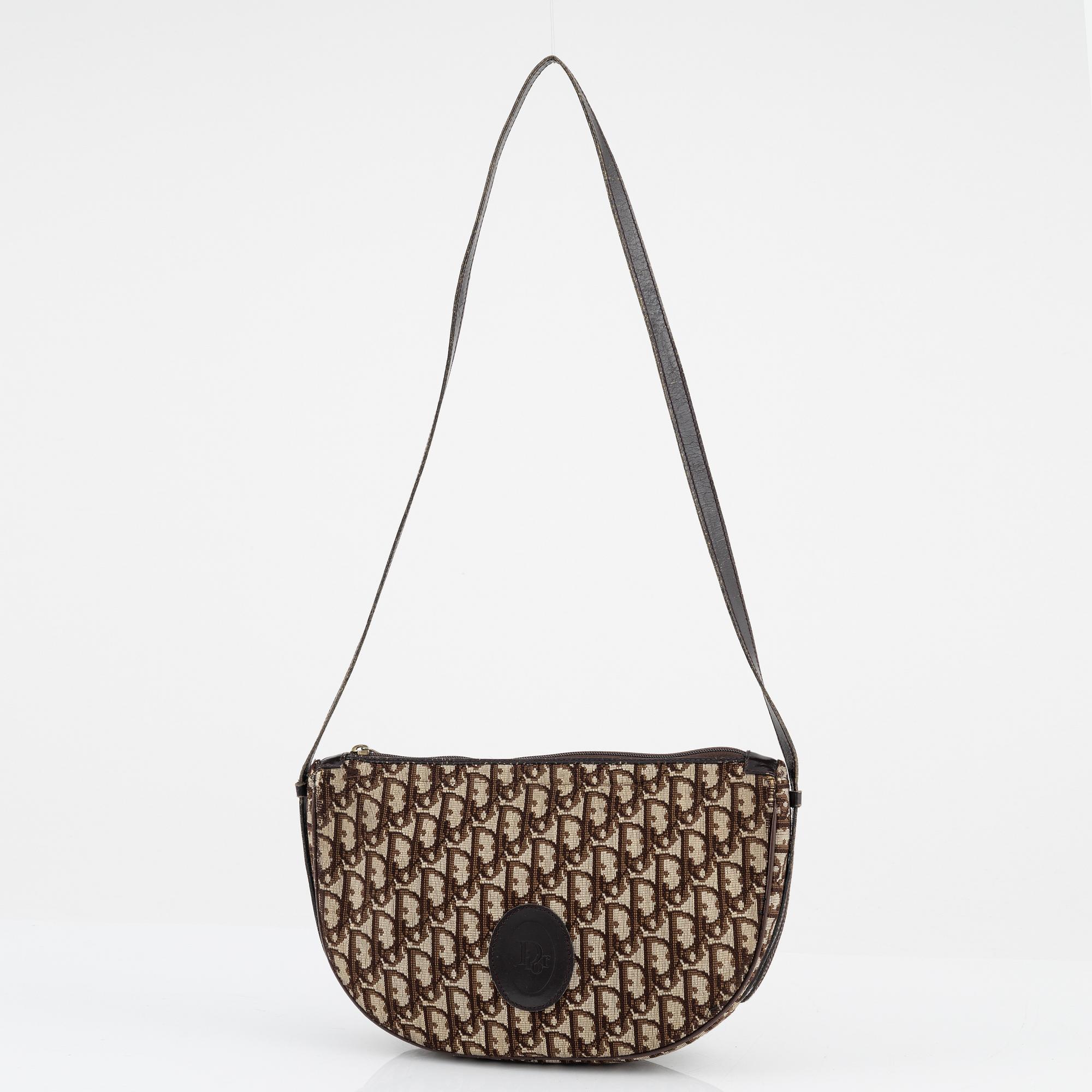 Christian Dior, A vintage bag and umbrella.