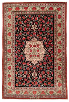 482. A signed silk Qum rug. c. 154 x 103 cm.