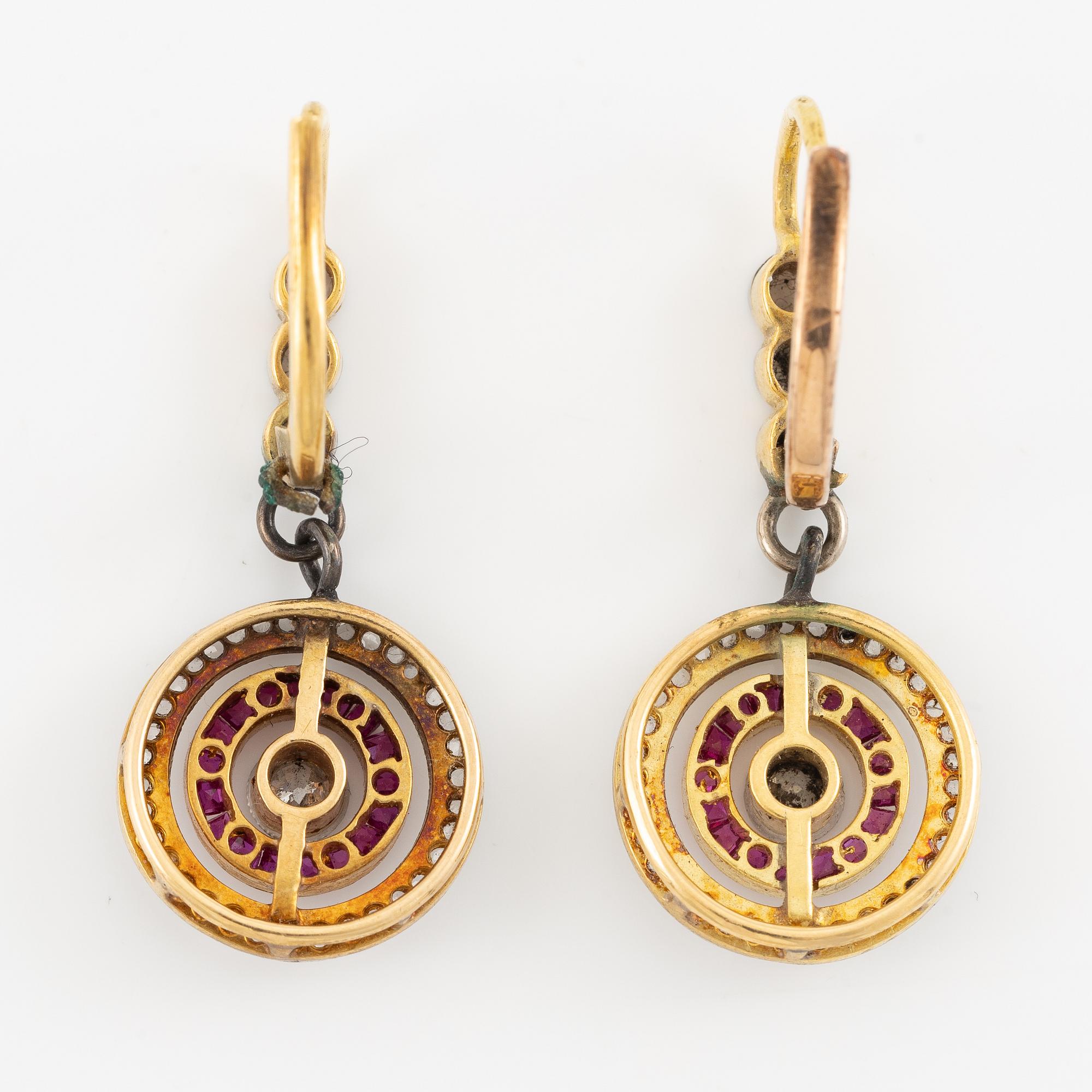 Earrings in gold with rubies and old-cut and rose-cut diamonds.