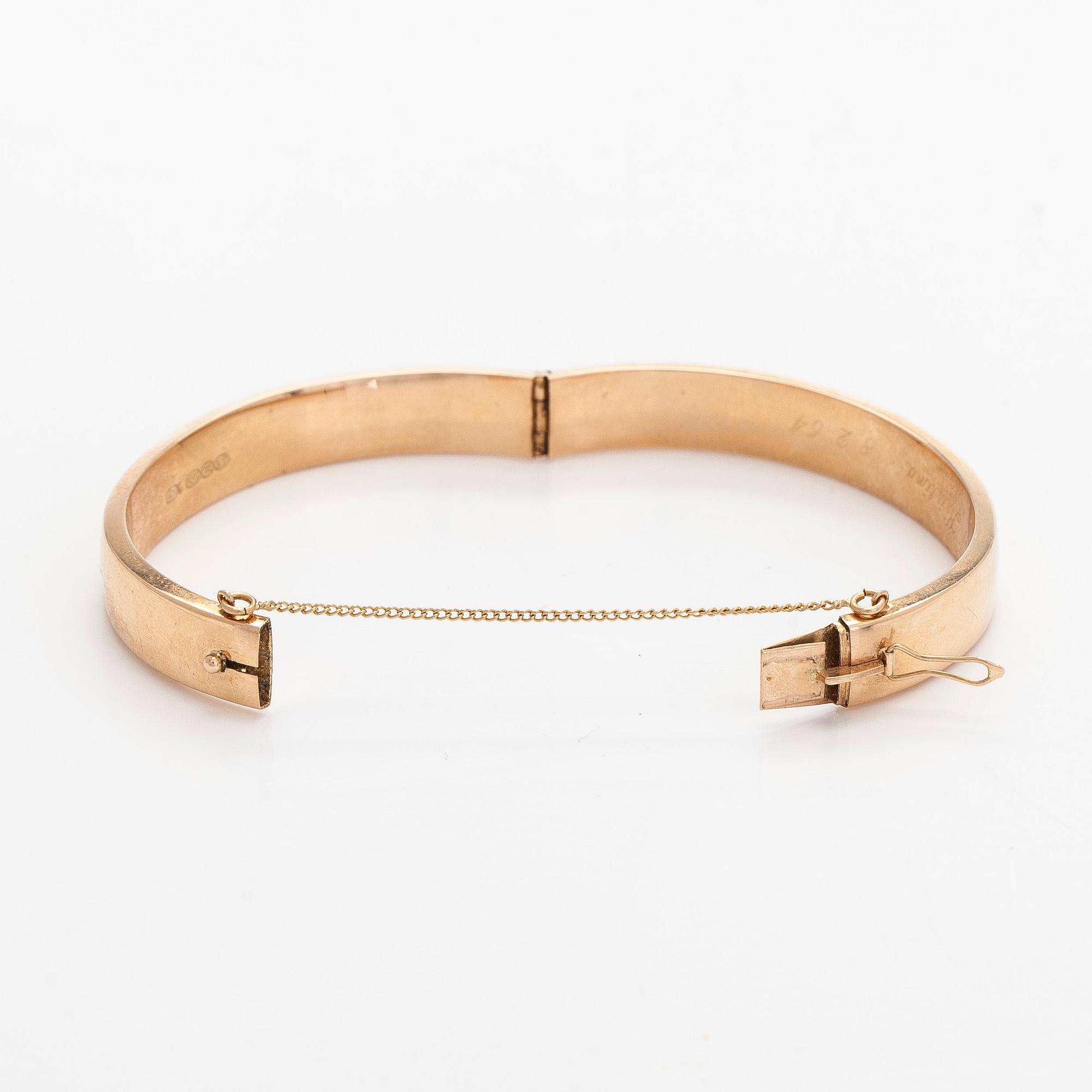 A 14K gold bracelet.