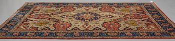 A CARPET, a semi-antique Tabriz, ca 342 x 269 cm.