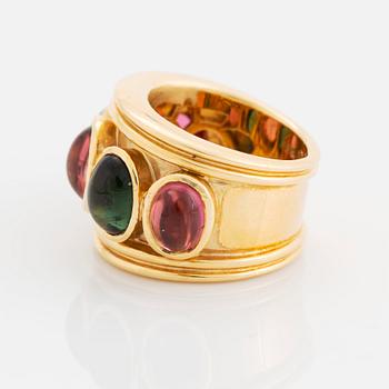 An 18K gold Temple St Clair ring set with cabochon-cut tourmalines.