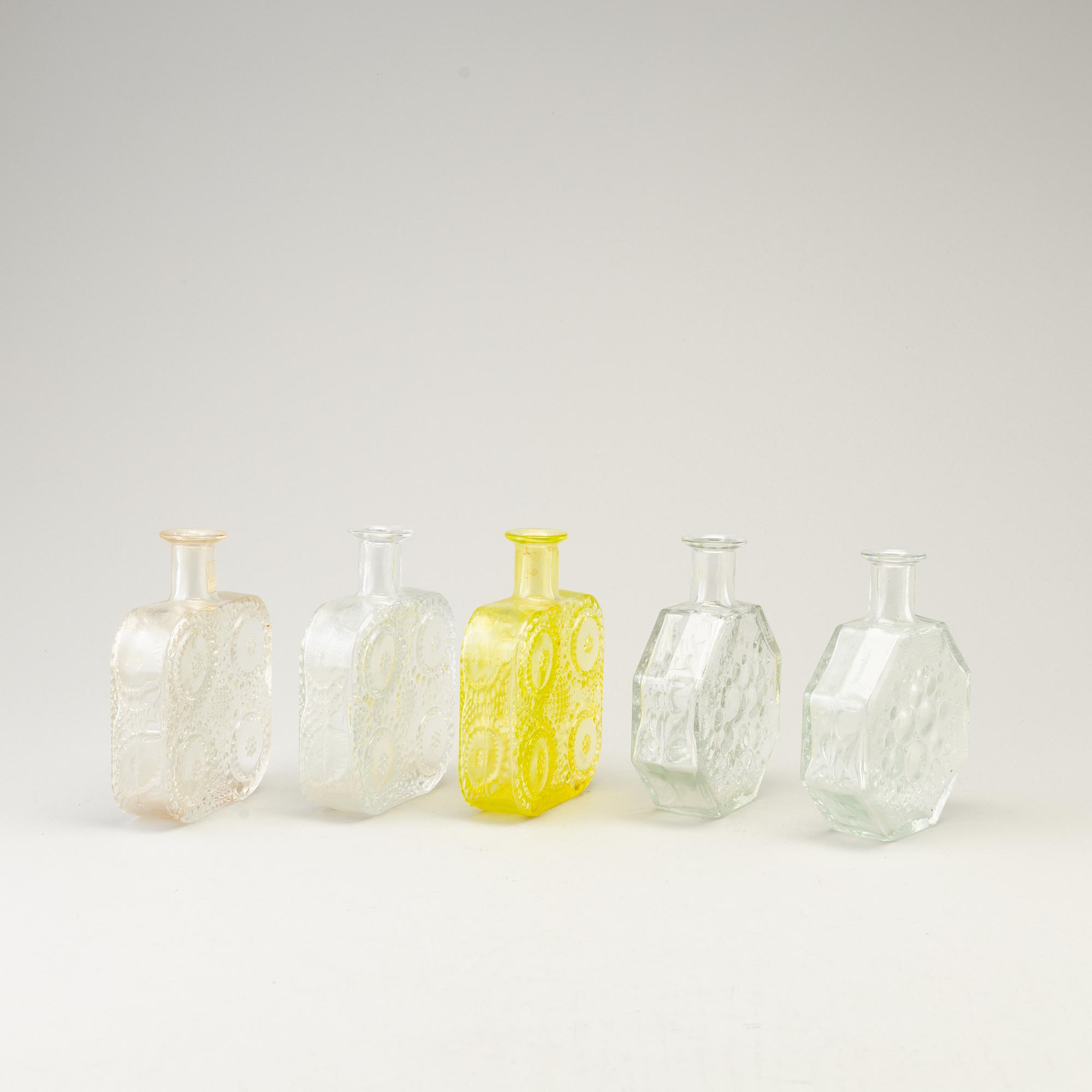 NANNY STILL, five glass bottles, 'Stella polaris' and 'Grapponia', Riihimäen Lasi, Finland.