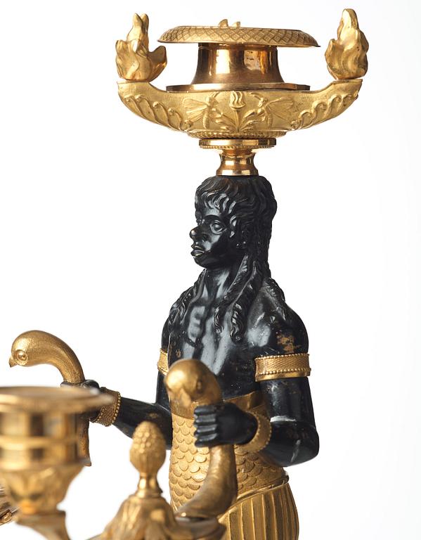 A pair of Empire three-light candelabra, circa 1810.