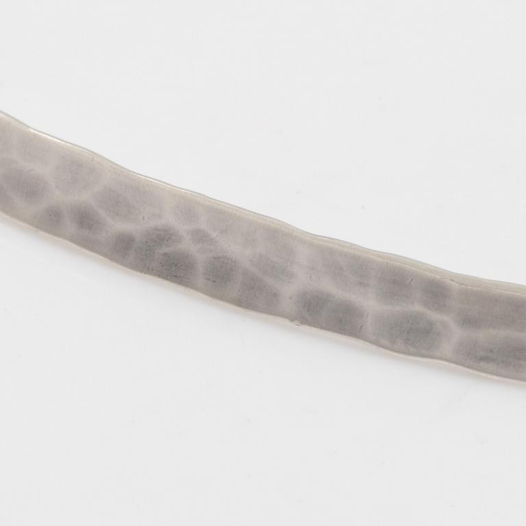 Annie Jägbeck silver necklace and earrings.