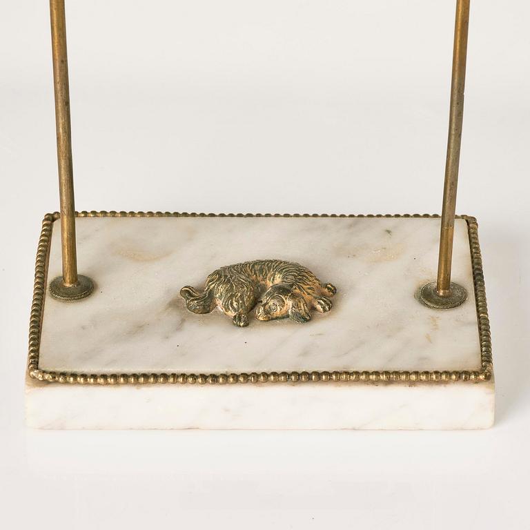 A Gusttavian gilt brass, white marble and tole two-light reading lamp, late 18th century.