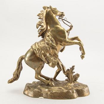 A bronze sculpture after Guillaume Coustau.