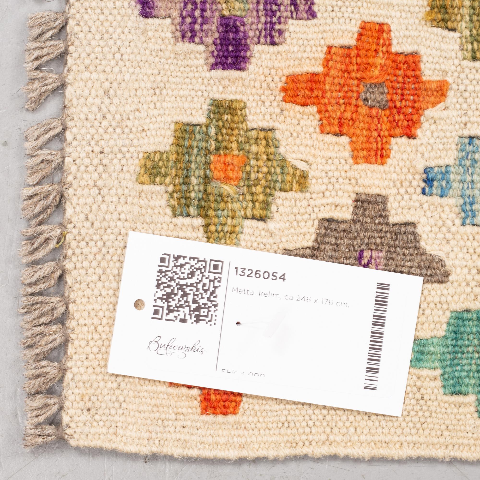A rug, kilim, ca 246 x 176 cm.