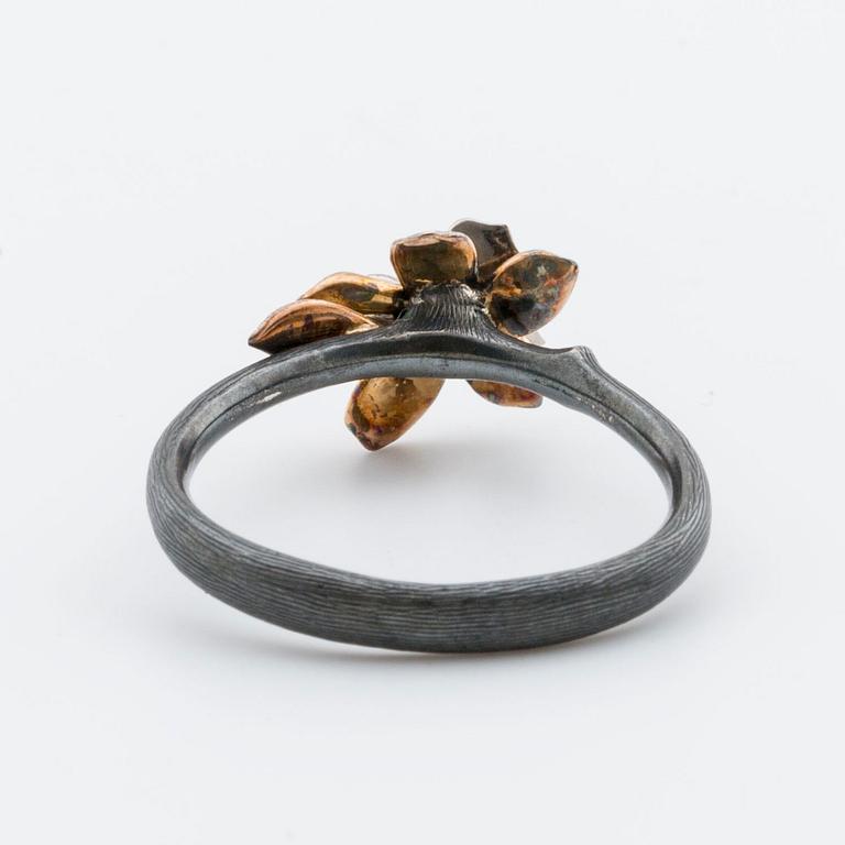 OLE LYNGGAARD RING silver and 18K gold.