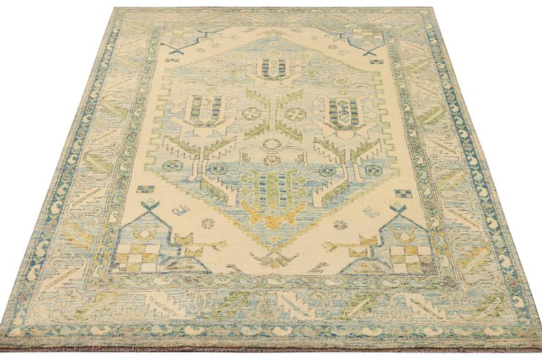 A Kazak carpet, c. 299 x 200 cm.