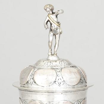 An 19th century parcel-gilt silver cup with lid, unidentified makers mark, probably Nürnberg.
