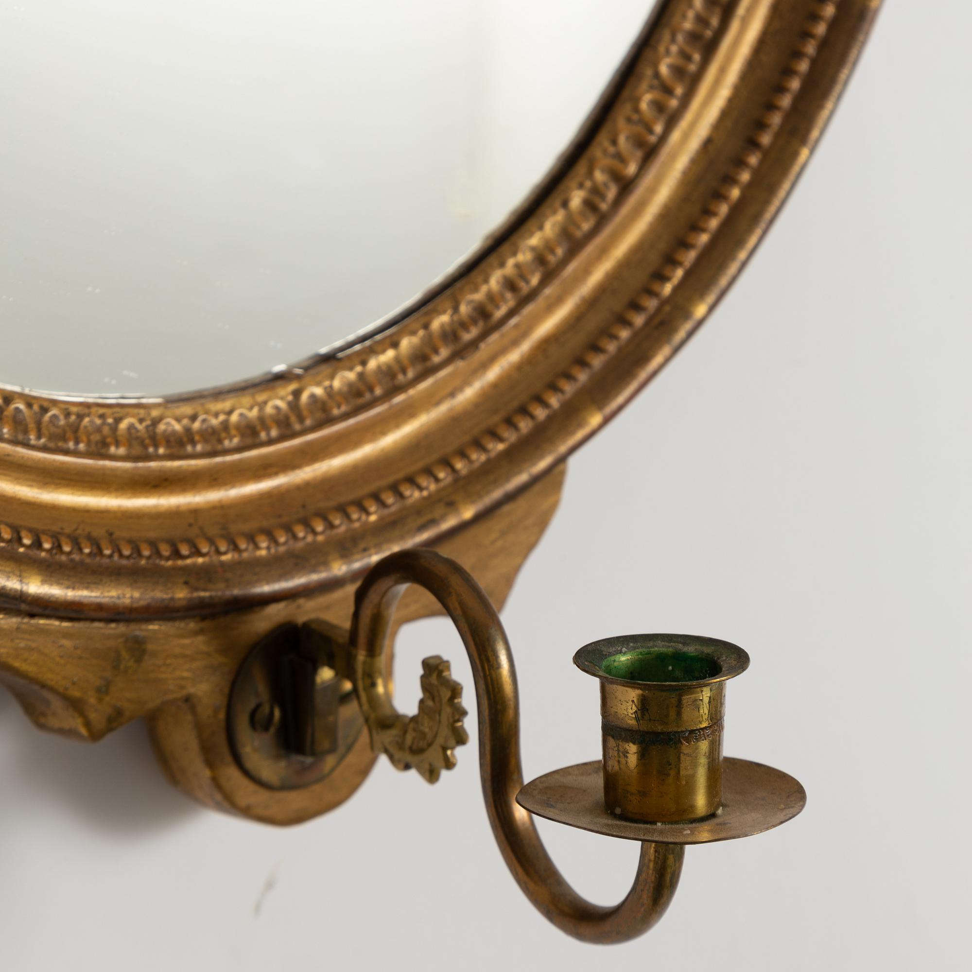 A pair of Gustavian style mirror sconces, early 20th centruy.