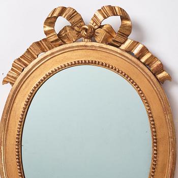 A pair of Gustavian two-light girandole mirrors, around year 1800.