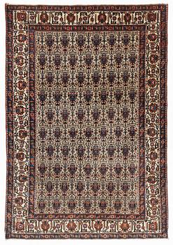 An oriental rug, c. 290 x 205 cm.