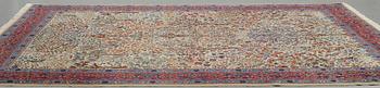 A CARPET, a semi-antique Tabriz probably, ca 393 x 284 cm.