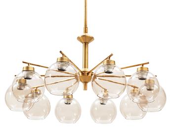 12. A ten-lights brass chandelier, probably by Hans-Agne Jakobsson, Markaryd, Sweden 1960's-70's.