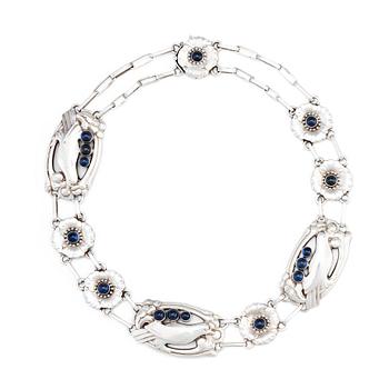 55. Georg Jensen, a sterling silver and cabochon cut lapis lazuli necklace, Copenhagen 1933-44, design nr 26.