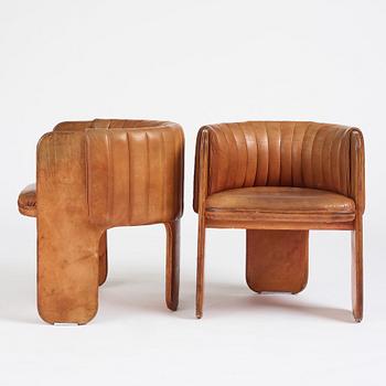 Luigi Massoni, a pair of easy chairs, Poltrona Frau, Italy 1970's.