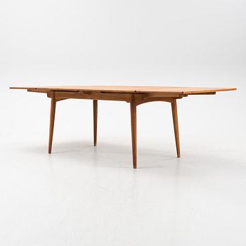 Hans J Wegner, a model 'AT-312' teak veneered dining table, Andreas Tuck, Denmark.