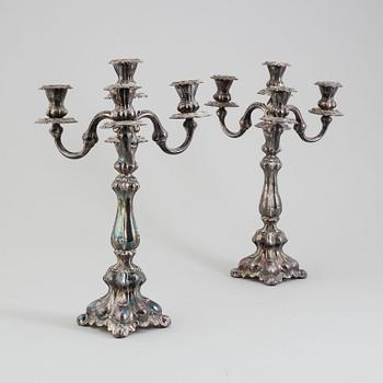 A first half of the 20th century pair of silver candelabras.