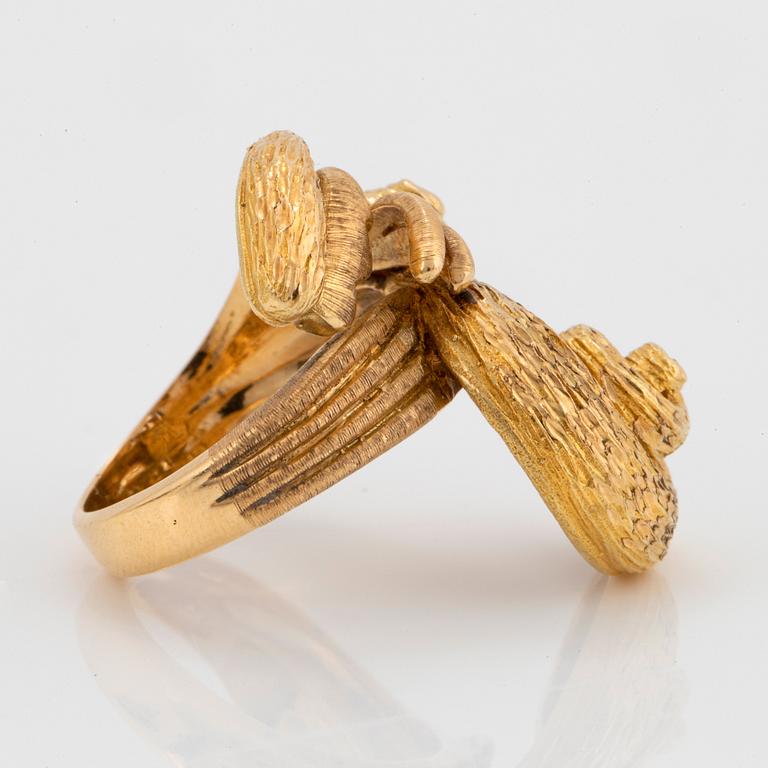 An 18K gold Ilias Lalaounis ring.