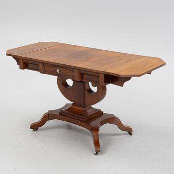 A Swedish Empire mahogany center table, early 19th century.