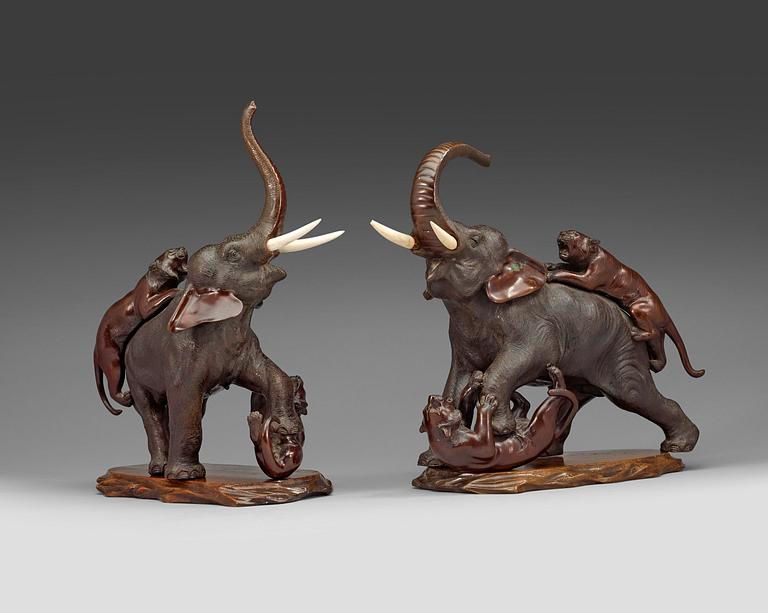 A pair of Japanese bronze sculptures of elephants, late Meiji (1868-1912).