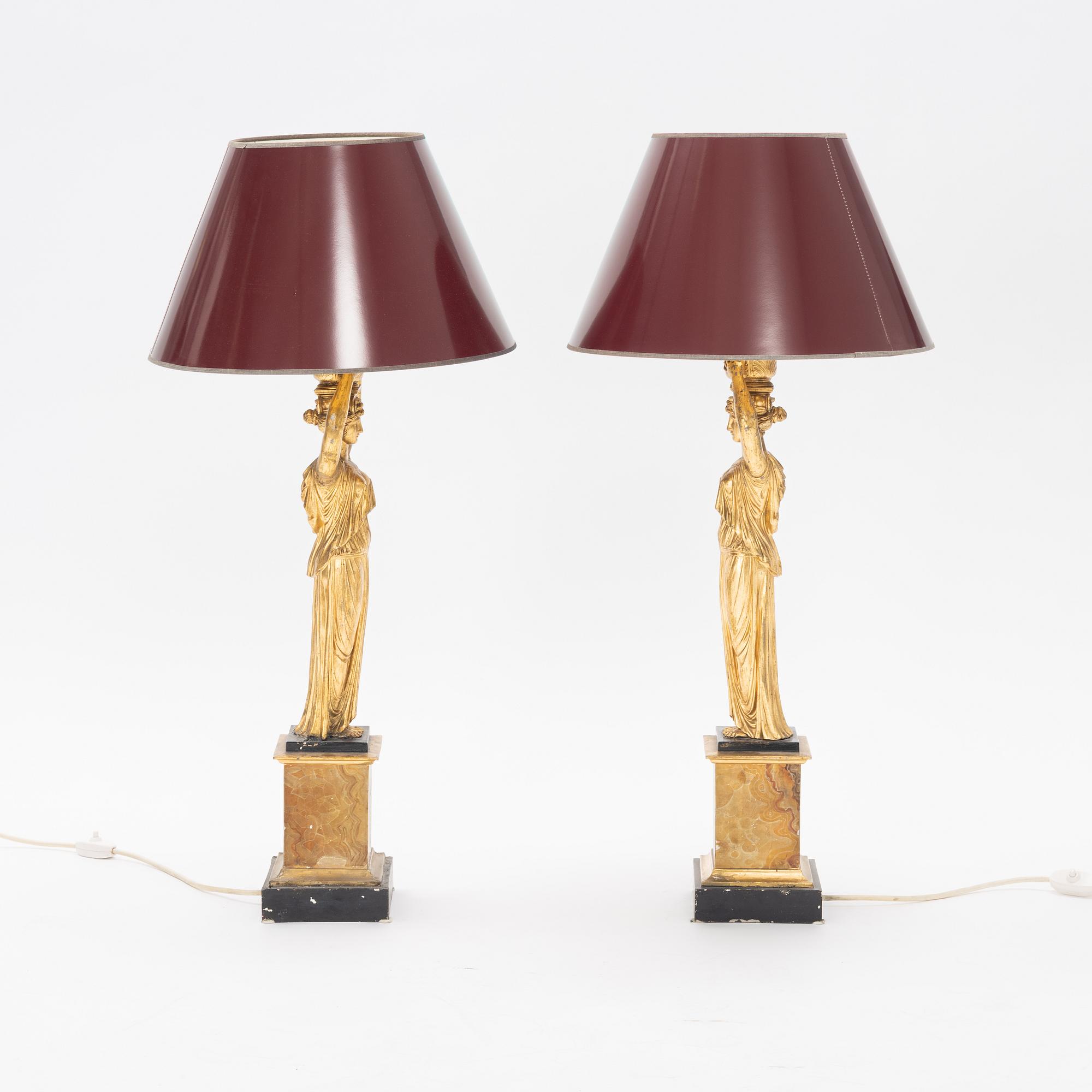 A pair of metal Empire style table lights, late 20th Century.