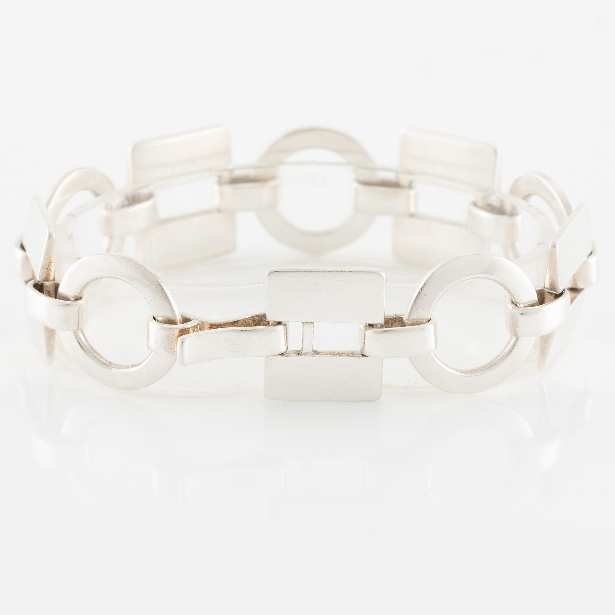 Sven-Erik Högberg, arm link, silver.