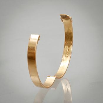 ARMRING, 18k guld. Finguld, Ivan Omelius, Malmö 1976. Vikt 49 g.