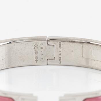 Hermès, a 'Clic H' bracelet.