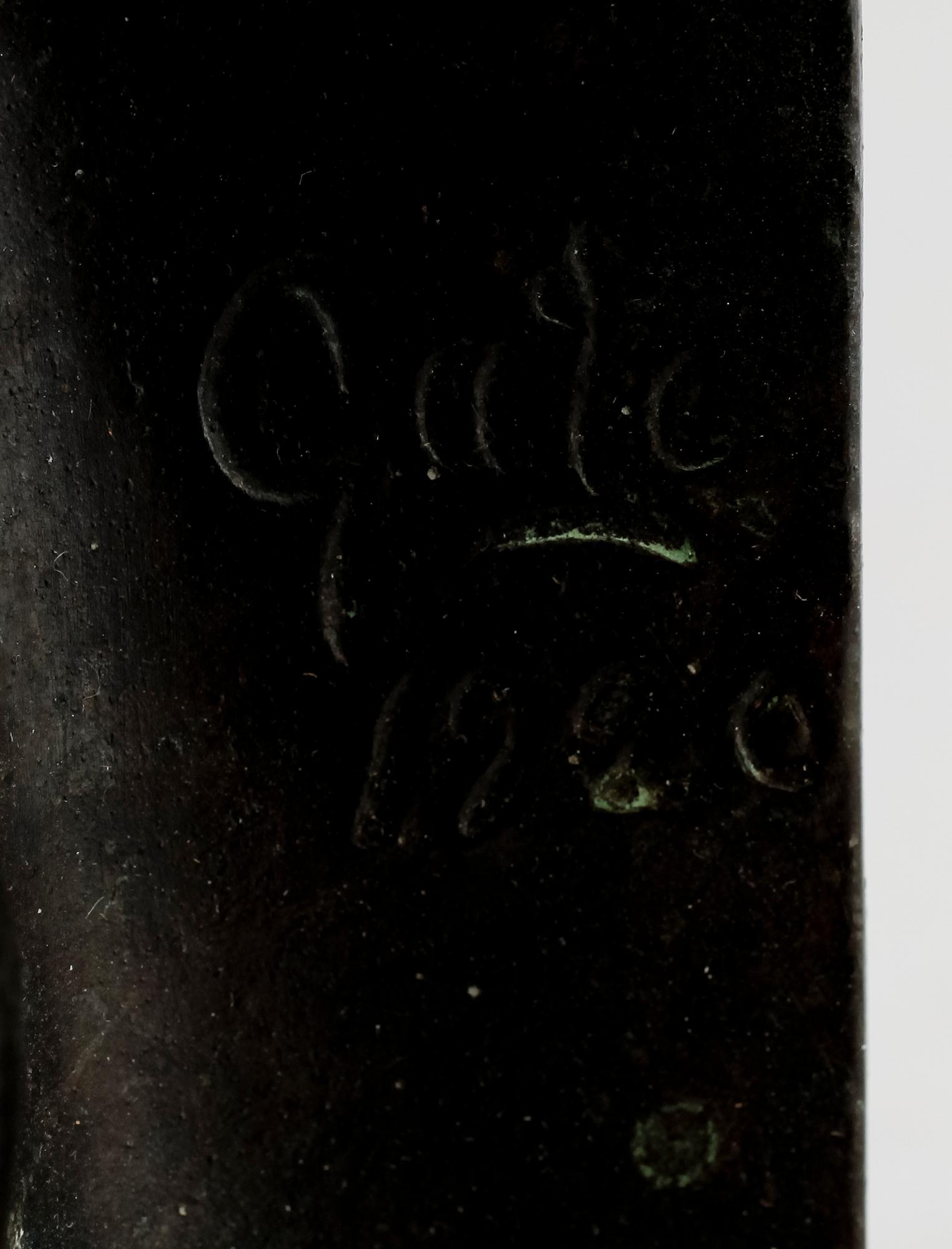 AXEL GUTE, bokstöd, 1 par, brons, sign och dat 1920.