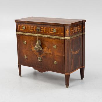 A Gustavian rosewood marquetry and gilt brass-mounted commode in the manner of G. Foltiern, late 18th century.