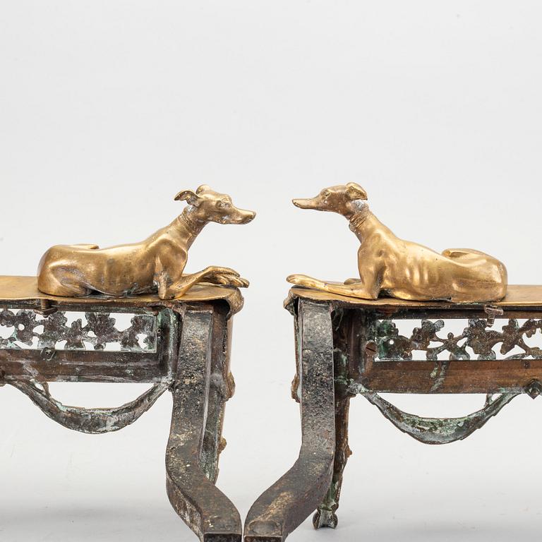 A pair of Louis XVI 18/19 century fire dogs.