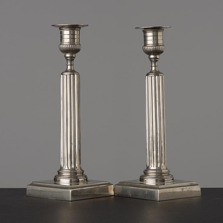 A pair of Gustavian white metal candlesticks by Isak Gråsten (1770-1821), Wedevågs Bruk.