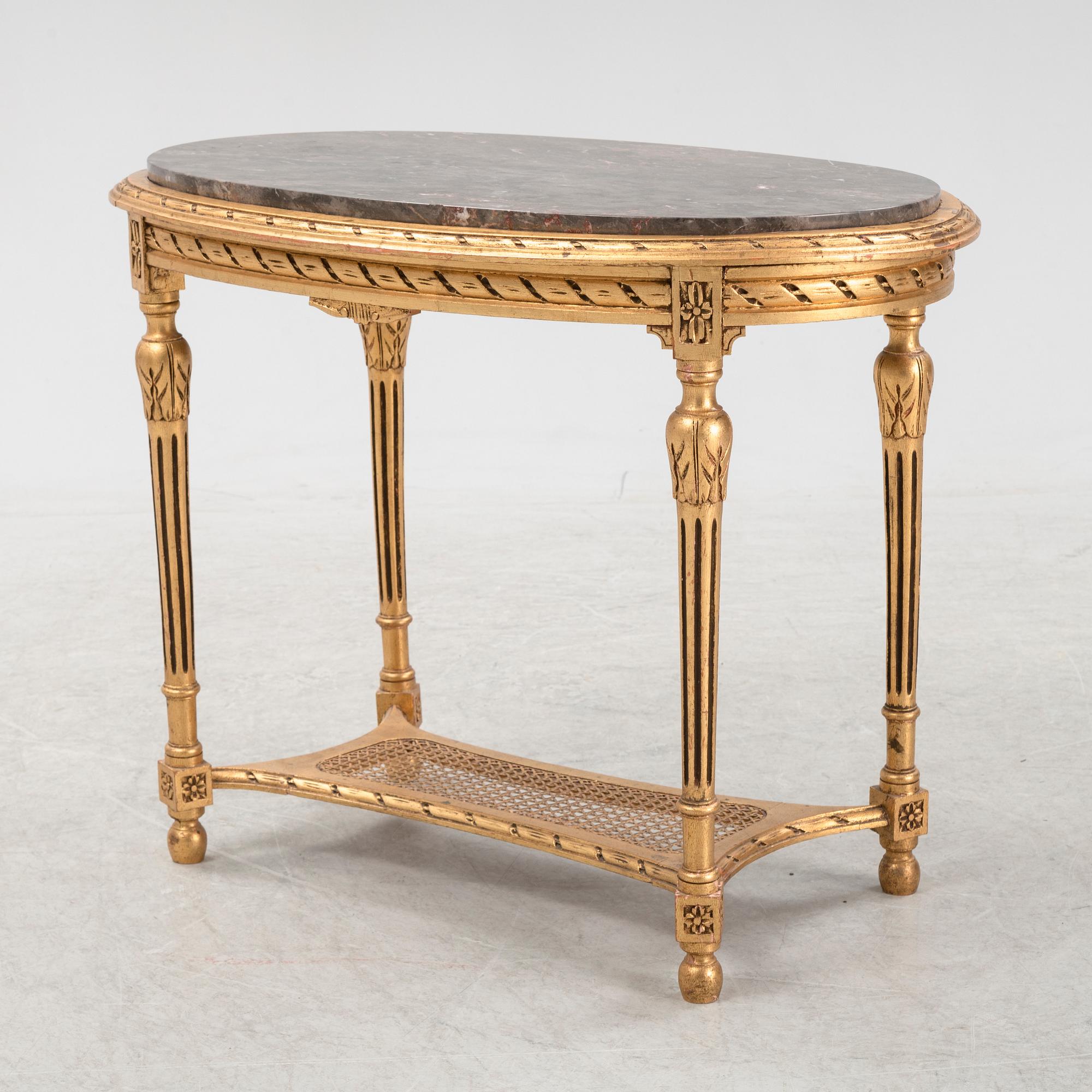 A Louis XVI style table, 20th Century.
